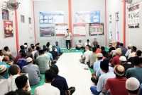 Kepala Lapas KeLas IIB Gunungsitoli, Tonggo Butar Butar, memberi arahan kepada 108 Warga Binaan Pemasyarakatan dalam Berbuka Puasa Bersama. ISTIMEWA/BALUSENIAS.COM